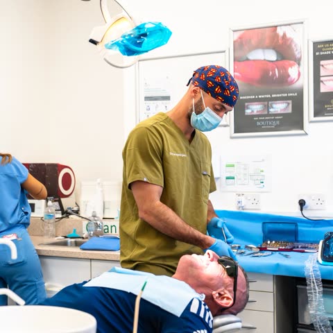 Dr Panagiotis Karageorgiou treating a patient