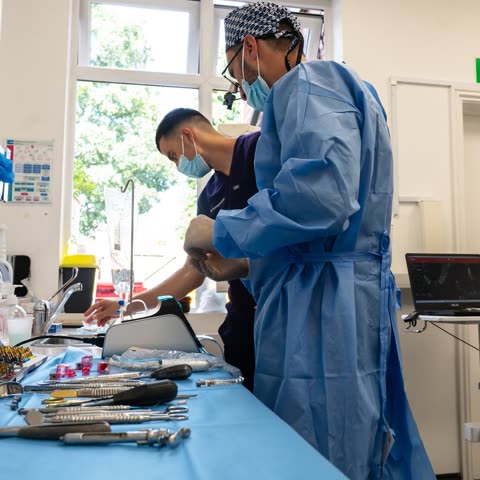The team preparing instruments before an implant procedure