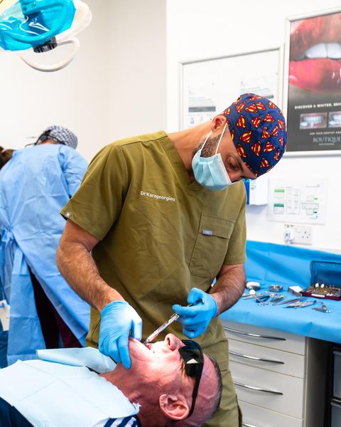 Dr Panagiotis Karageorgiou treating a patient